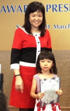 Linn with her Silver medalat the Shichida Prize giving